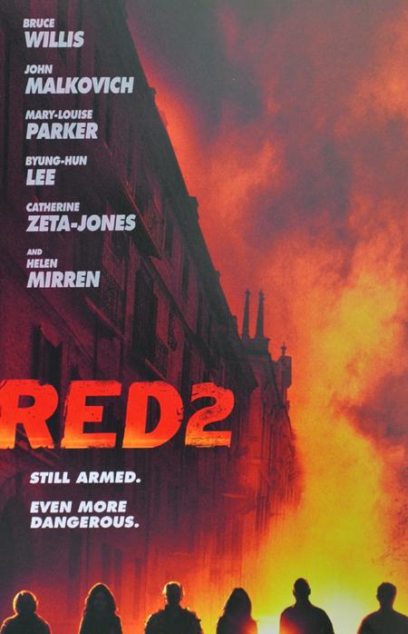 Cartel promocional de RED 2 visto en el Festival de Cannes